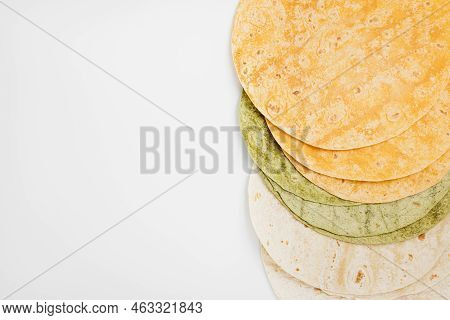 Tomato, Spinach Flavored And Plain Wheat Tortilla Wraps. Spanish Or Mexican Circular Unleavened Flat