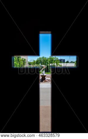 Omaha, Nebraska, Us - 5.2022 - View Out Of A Cross Window Of St. Johns Parish Catholic Church On The