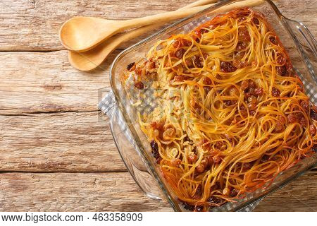 Jerusalem Noodle Kugel A Jewish Pie For Shabbat Kodesh Close-up In A Glass Bowl On The Table. Horizo