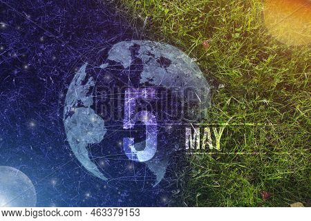 May 5th. Day 5 Of Month, Calendar Date. Day To Night Background Concept. Scene With Globe The Green 