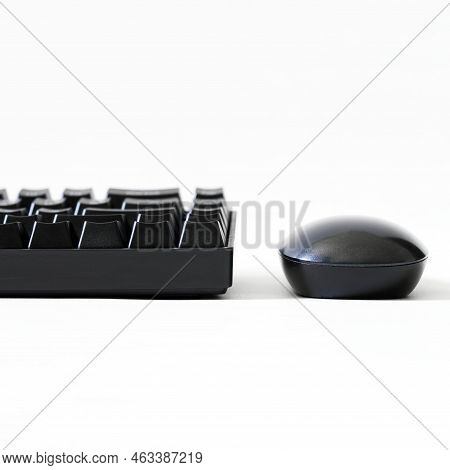 Computer Mouse And A Fragment Of A Black Mechanical Gaming Computer Keyboard On A White Background. 