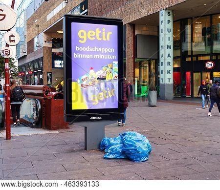 The Hague, Netherlands - January 03 2022: An Advertisement Screen In The Shopping Street For A Fast 