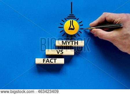 Fact Vs Myth Symbol. Concept Words Fact Vs Myth On Wooden Blocks On A Beautiful Blue Table Blue Back