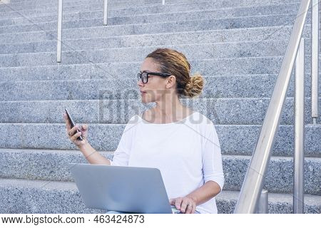 Business Woman Beautiful Female Working With Phone Device And Laptop Computer Aoutdoor Witting On A 