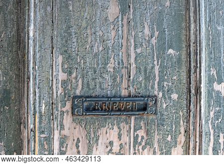 Old Mailbox In An Old Door; 'brieven' (dutch For Letters)