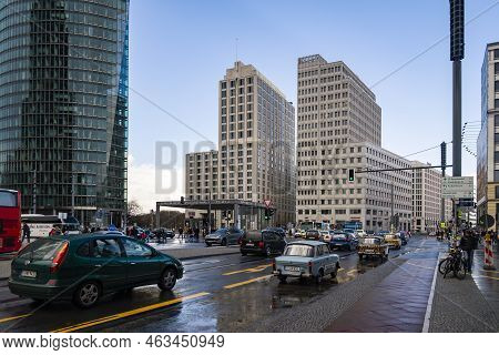 Berlin, Germany - April 2, 2015:: Traffic And Trabant Cars Near The Modern Building At Potsdamer Pla