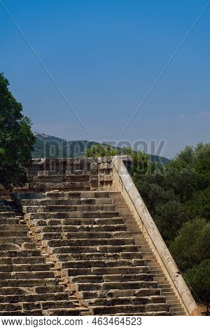 Ancient Greek Theater Empty Marble Seats Detail Against Blue Sky At The Asclepieion Of Epidavros, Gr