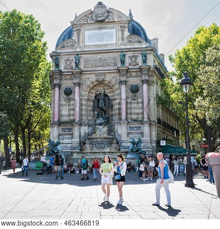 Paris, France - August 27 2022: People By The Fontaine Saint-michel Located In Place Saint-michel In