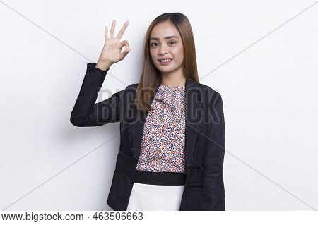 Young Asian Beautiful Woman With Ok Sign Gesture Tumb Up Isolated On White Background