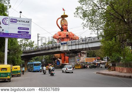 New Delhi, India - June 21, 2022 - Big Statue Of Lord Hanuman Near The Delhi Metro Bridge Situated N