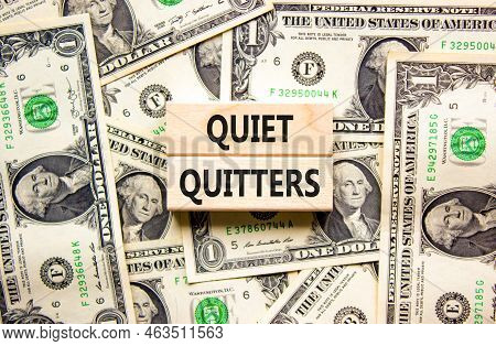 Quiet Quitters Symbol. Concept Words Quiet Quitters On Wooden Blocks. Beautiful Background From Doll