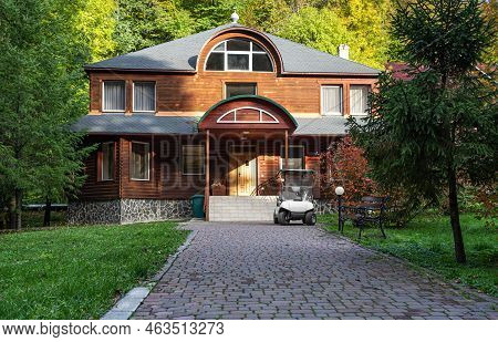 Cozy Wooden House On The Background Of Nature.