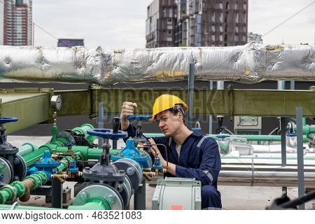 Industrial Engineer Work On Site. Engineer Visit And Inspection Site Engineer At Industrial Site. In