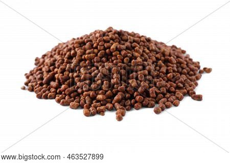 Pile Of Buckwheat Tea Granules On White Background
