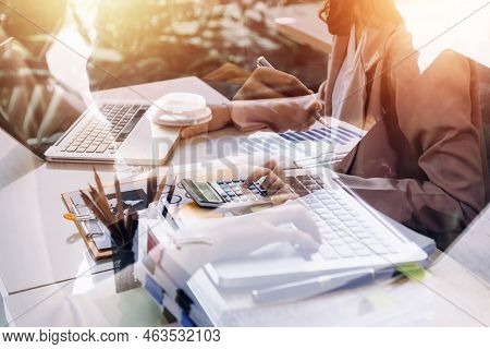 Businesswoman Hand Working With Laptop Computer, Tablet And Smart Phone In Modern Office With Virtua