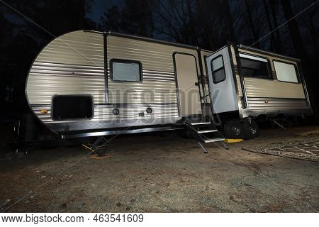 Long Rv At Night In A Forest Near Jordan Lake North Carolina