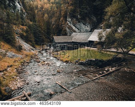 Photo Of A Beautiful Wooden Cabin With River In The Forest From Above - Mlyny Oblazy (slovakia) - Ta