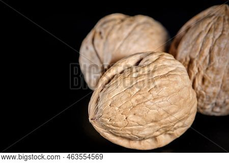 Walnut Photography On A Black Background Photographed Close-up