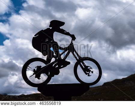 Timmelsjoch, Austria - July 26, 2022: Silhouette Of A Cyclist On The Timmelsjoch Mountain Pass In Th