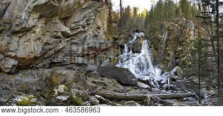 Russia. South Of Western Siberia. One Of The Most Beautiful Waterfalls Of The Altai Mountains On The