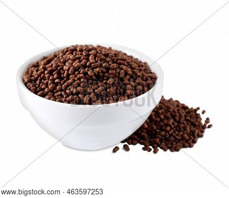 Bowl With Buckwheat Tea Granules On White Background
