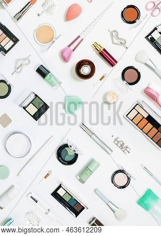 Feminine Makeup Aqua Mente And Pink Palette Accessories With Nail Polish Manicure Tools On White Bac