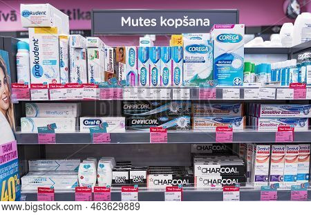 Latvia, Riga, October, 2022 - A Large Selection Of Tooth Pastes, Tooth Rinse And Oral Care Products 