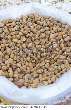 Rolled Up Sack Full Of Tiger Nuts Or Chufas. Displayed At Street Market Stall