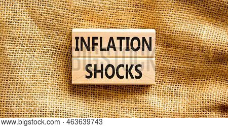 Inflation Shocks Symbol. Concept Words Inflation Shocks On Wooden Blocks. Beautiful Canvas Table Can