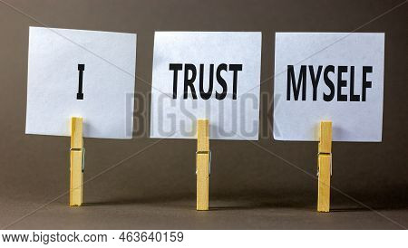 I Trust Myself Symbol. Concept Words I Trust Myself On White Papers On Wooden Clothespins. Beautiful