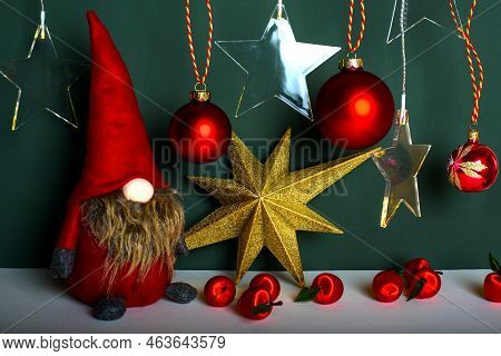 Christmas Decoration And Background With Tomte And Christmas Balls