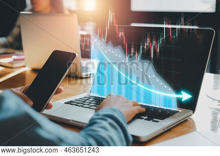 Cost Reduction Business Finance Concept, Businessman Hand Working On Laptop With Virtual Screen Cost