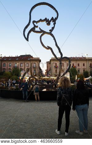 Alba, Italy - October 2, 2022: Alba, Fountain And Girl Sculpture By The Artist Valerio Berruti In Pi