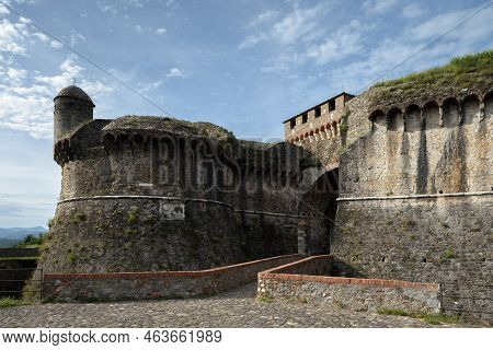 Towers And Walls With Bridge And Moat Of The Medieval Fortress Of Sarzanello In Sarzana, Beautiful T