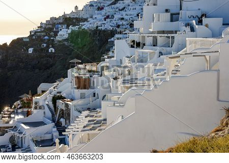 Imerovigli, Santorini, Greece - June 29, 2021: Whitewashed Houses With Terraces And Pools And A Beau