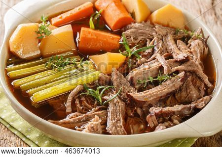Beef Meat And Vegetables Stew Homemade Slow Cooker Pot Roast With Carrots, Celery And Potatoes Close