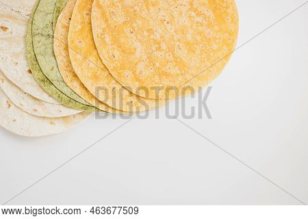 Tomato, Spinach Flavored And Plain Wheat Tortilla Wraps. Spanish Or Mexican Circular Unleavened Flat