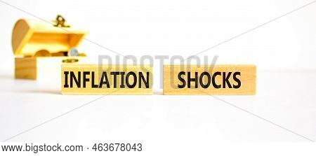 Inflation Shocks Symbol. Concept Words Inflation Shocks On Wooden Blocks. Beautiful White Table Whit
