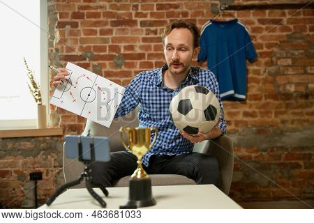 Young Man, Soccer Fan Recording Vlog About Last Football Match And Shares His Opinion On The Strateg