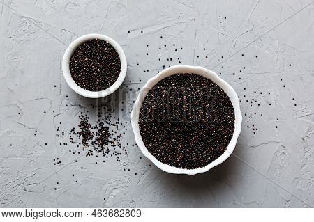 Quinoa Seeds In Bowl On Colored Background. Healthy Kinwa In Small Bowl. Healthy Superfood.