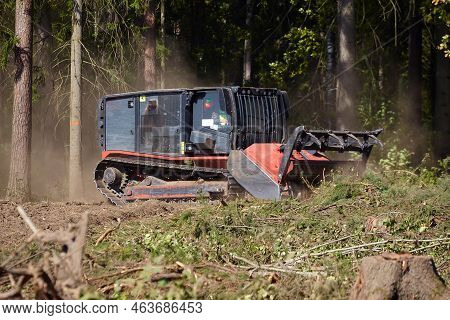 Forest Mulcher That Cleans The Soil In The Forest. Tracked General Purpose Vehicles Used For Vegetat