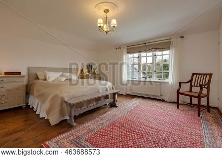 Stradishall, England - March 21 2016: Traditional Styled Furnished Bedroom Interior