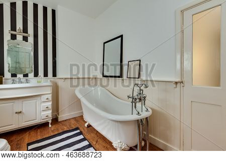 Stradishall, England - March 21 2016: Contemporary Modern Bathroom With Victorian Style Bathtub