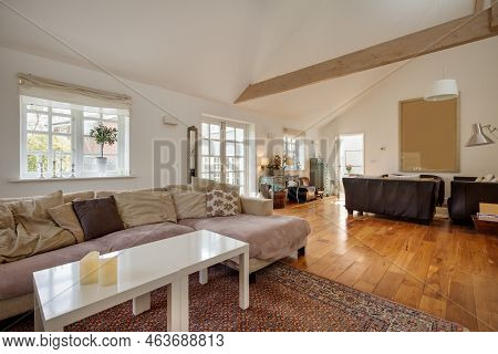 Stradishall, England - March 21 2016: Contemporary Furnished Modern Living Room With Vaulted Ceiling