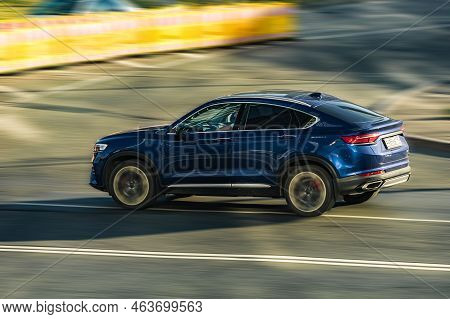 Car Geely Tugella Also Called Geely Xingyue In Motion. Compact Crossover Suv Model Moving On Speedwa