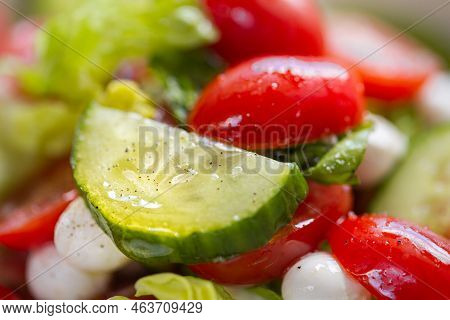 Fresh Lettuce Macro Shot. Salad With Baby Mozzarella Cherry Leaves Iceberg. Olive Oil In Salad. Sala