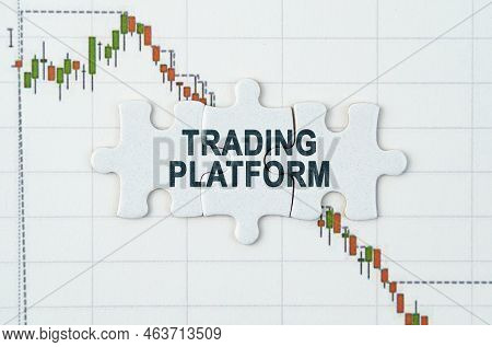 Business Concept. On The Quotes Chart There Are Puzzles With The Inscription - Trading Platform