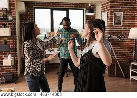 Multicultural Friends, Mates, Partners Drinking Wine, Having Fun, Laughing At Reunion. Smiling, Chee