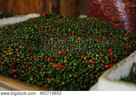 Heap Of Fresh Delicious Chiltepin On Counter At Market