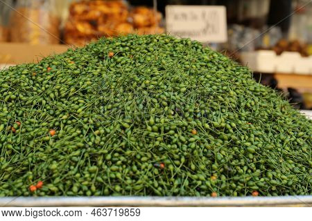 Heap Of Fresh Delicious Chiltepin On Counter At Market